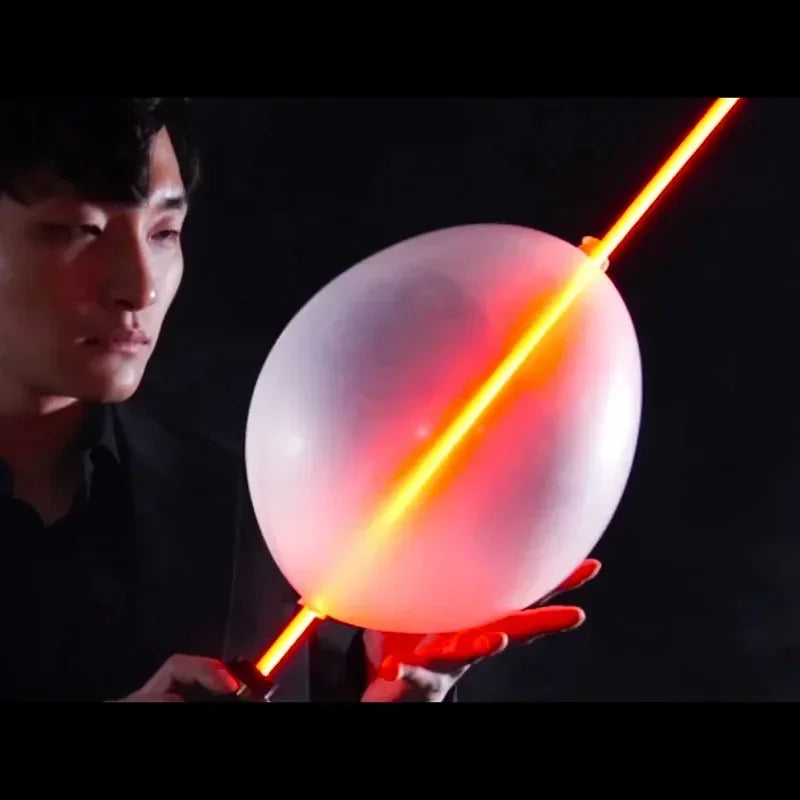 S-Ray by Sun Magic Tricks Chargable Lightsaber Thru Balloon